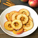 Dehydrated apple chips on plate