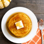 Pumpkin pancakes on a plate from above