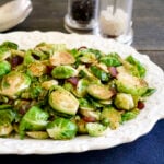 Brussels sprouts with bacon on a platter